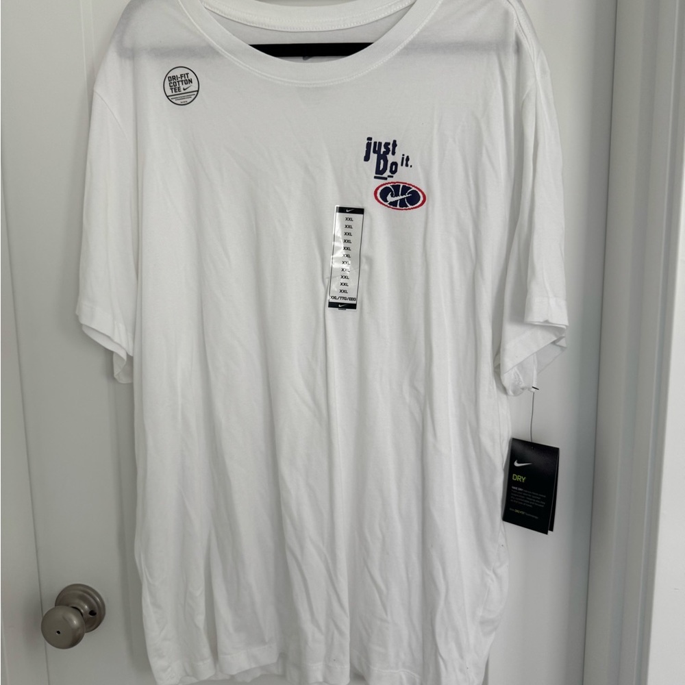 Never worn 
Nike White Just Do It Men's shirt new with tags size xxl